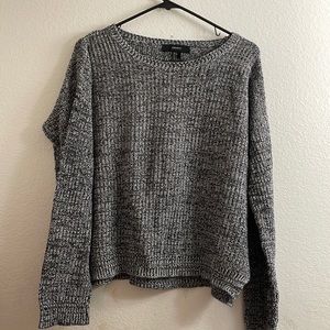Black, gray and white knit sweater